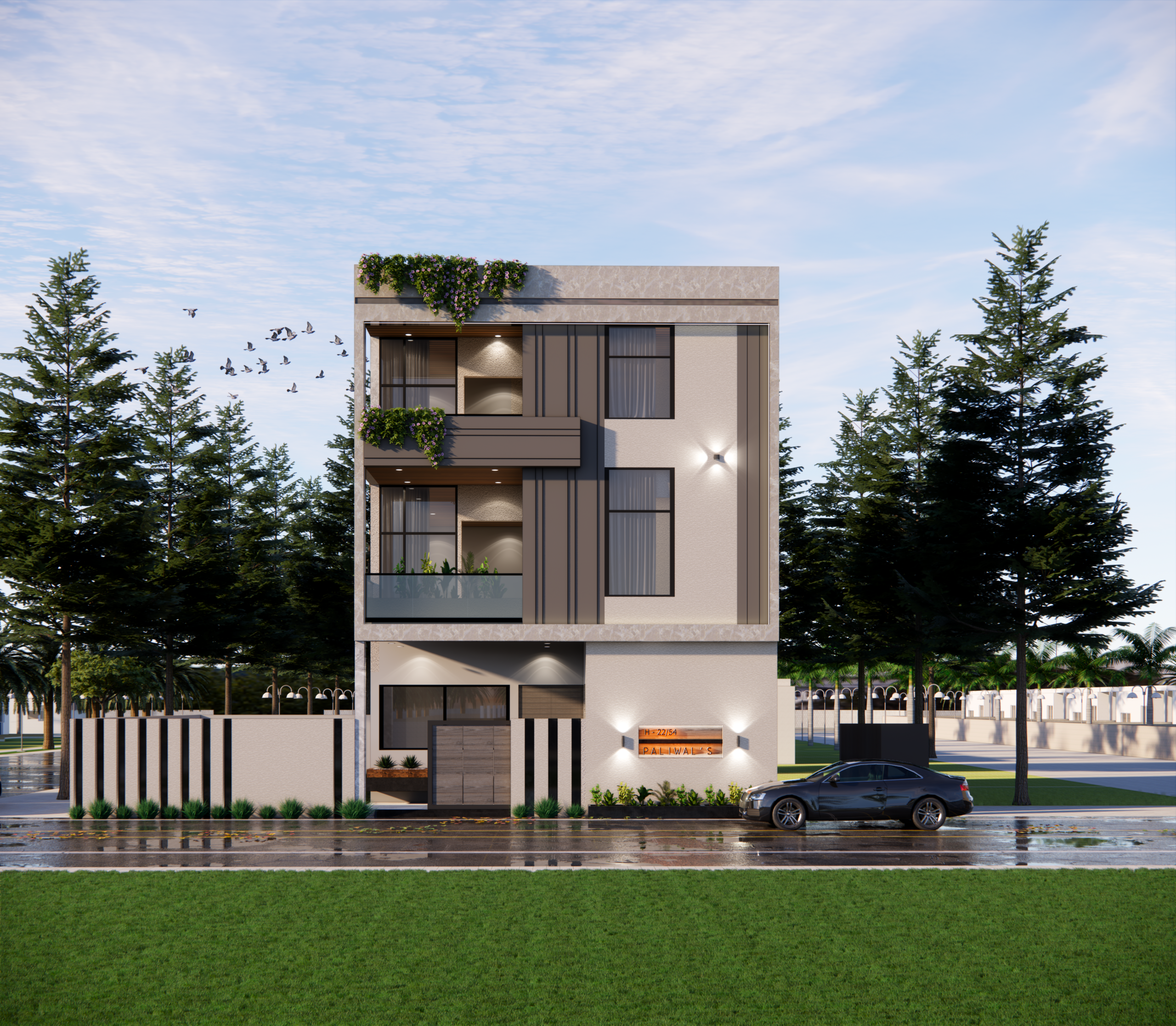Modern residential building exterior in Indore featuring vertical panels, balconies with greenery, and a boundary wall.