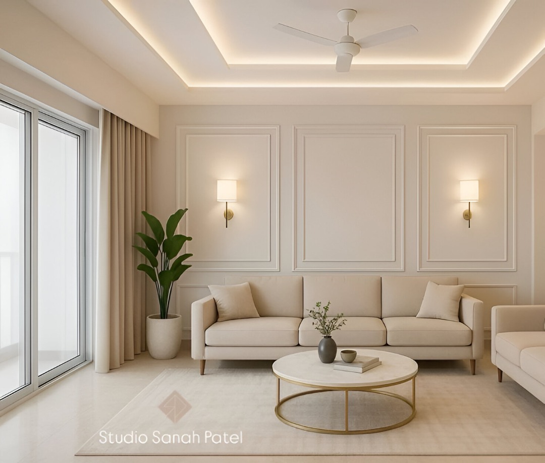 Modern minimalist living room in Indore featuring neutral tones, wall paneling, sconces, and a round coffee table.